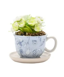 MACETERO FORMA TAZA ALICIA PAIS DE LAS MARAVILLAS CON PLANTA
